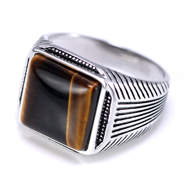 Anel Masculino Sinete Olho de Tigre em prata 925 importada é a escolha perfeita para homens que valorizam sua identidade e cultura. Anel de prata, anel sinete, anel para homens com mãos grandes da arquetiposhop.com.br